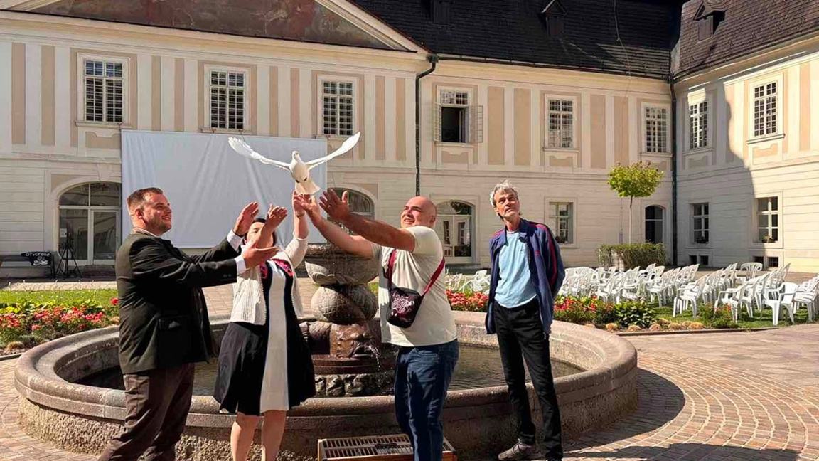 Bulgarian racing pigeons set off for home from a castle in Slovakia