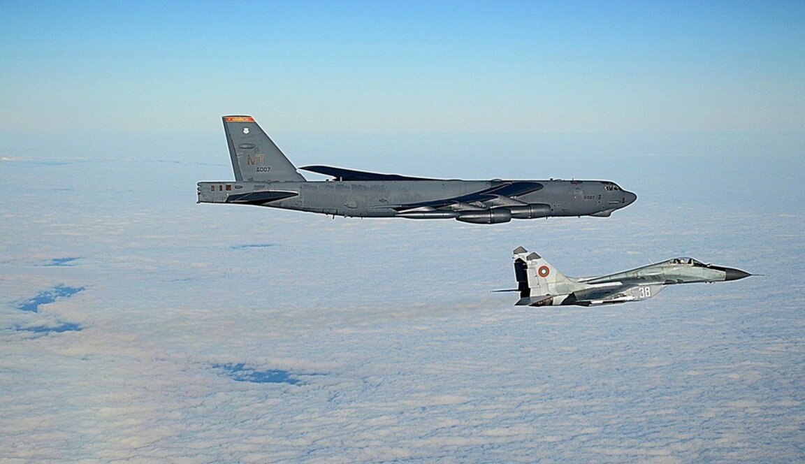 Bulgarian MiG-29 fighter jets escort a US B-52 strategic bomber as part of a joint training exercise