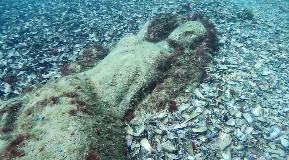 Chapel inhabited by fish and mermaid on the sea bottom - underwater adventures near Primorsko
