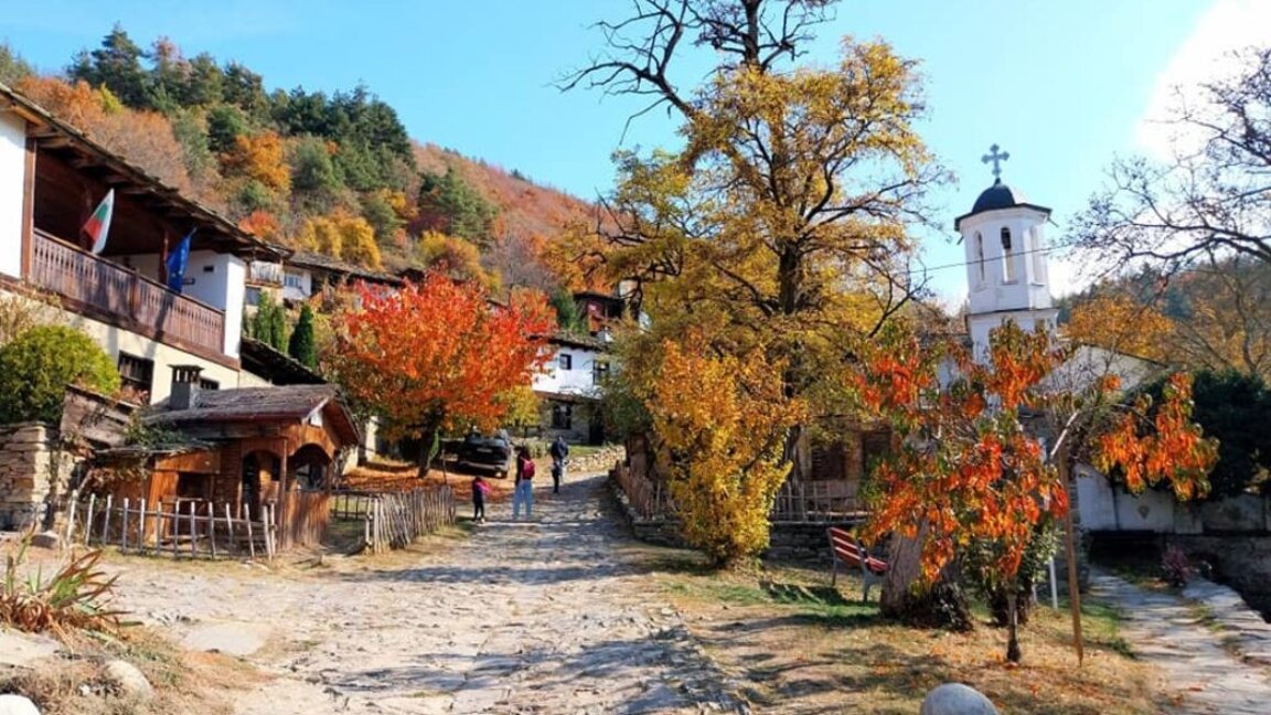 An autumn walk along the cobblestone streets of the village of Leshten