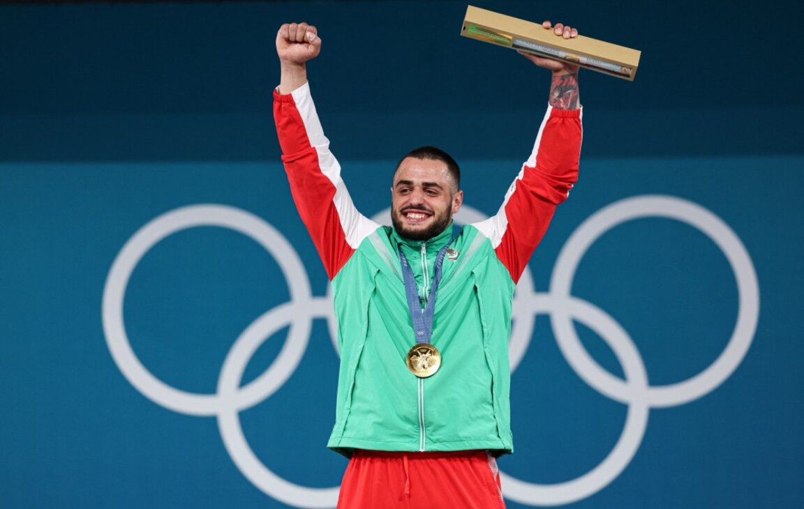 Karlos Nasar with the Olympic gold medal