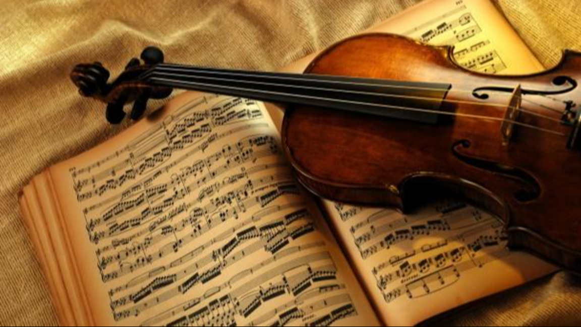Цигулка и партитура