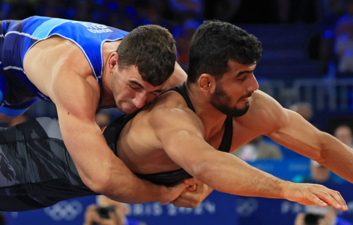 Semen Novikov (majtas) dhe Alireza Mohmadipiani