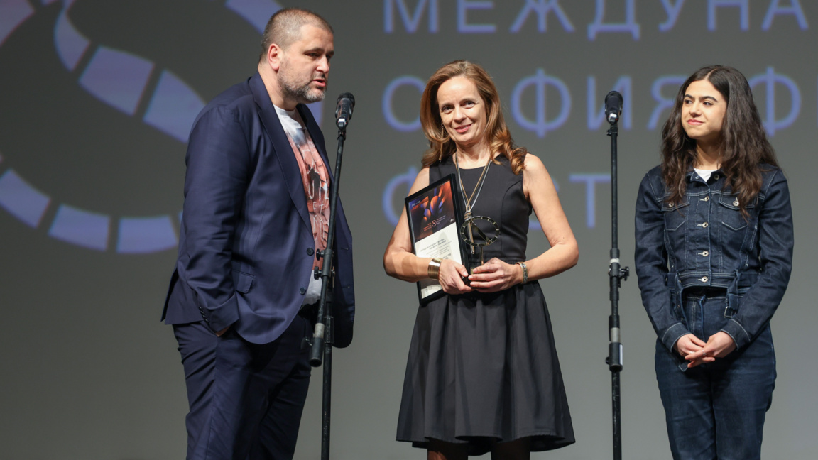 Producers Poli Angelova and Nikolay Todorov receive an award for the film Atlas of the Universe