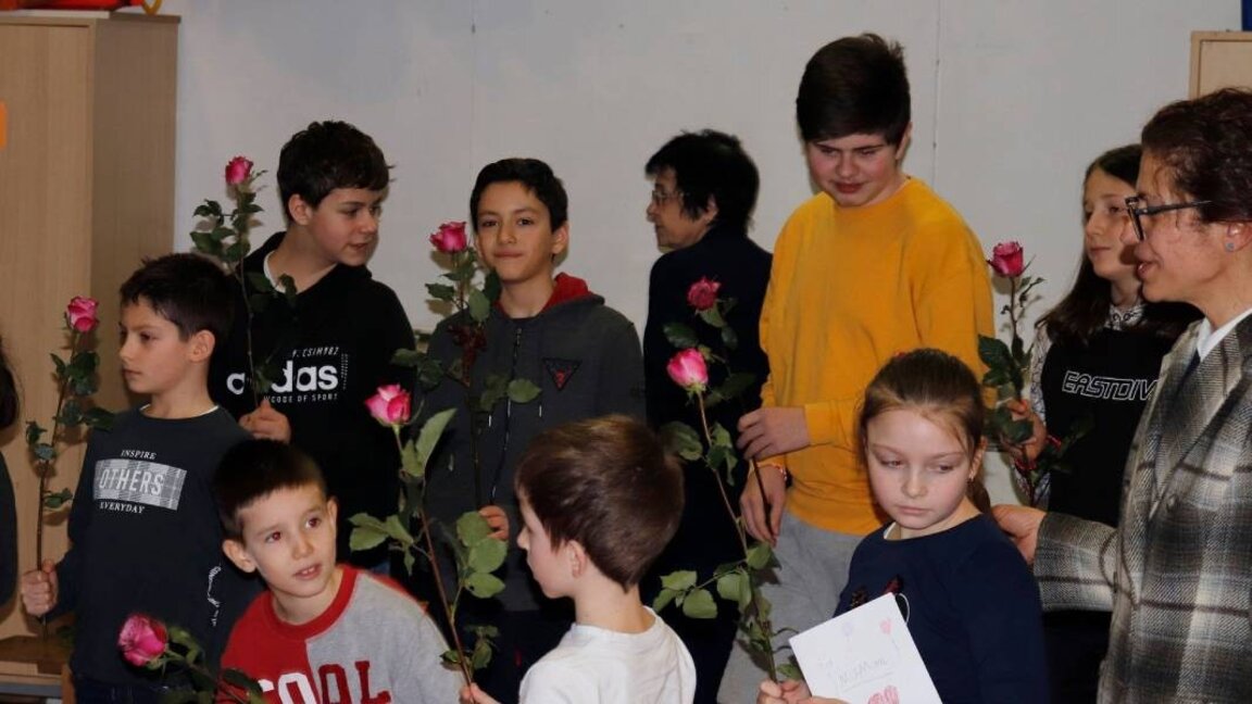 Kids and dads recite Bulgarian poetry for International Women's Day in Paris
