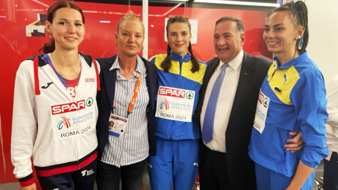 Stefka Kostadinova (second from L) at the awarding of Yaroslava Mahuchikh (C) at the European championship in Rome