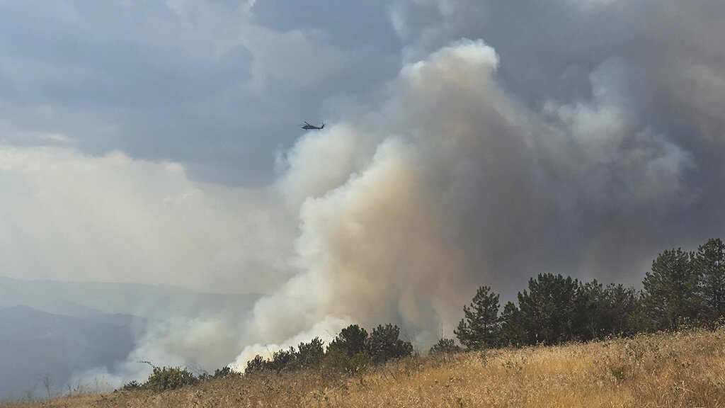 Firefighters continue to battle the fire in Pirin Mountain